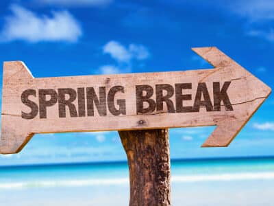 Spring Break sign with beach background